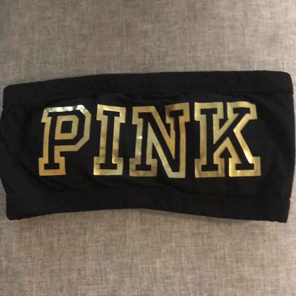 Pink Victoria’s Secret black and gold swim top
